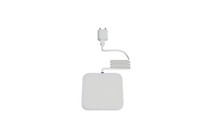 The smaller AnnaCare Home sensor pad and power supply for home use